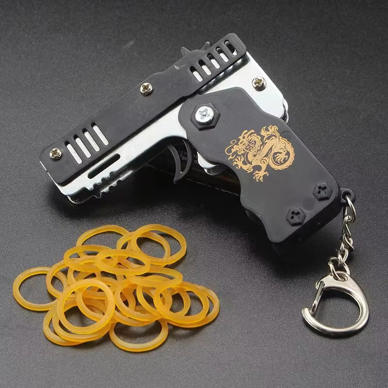 Mini rubberbandpistool sleutel - Home Security Gun recensie en prijs
